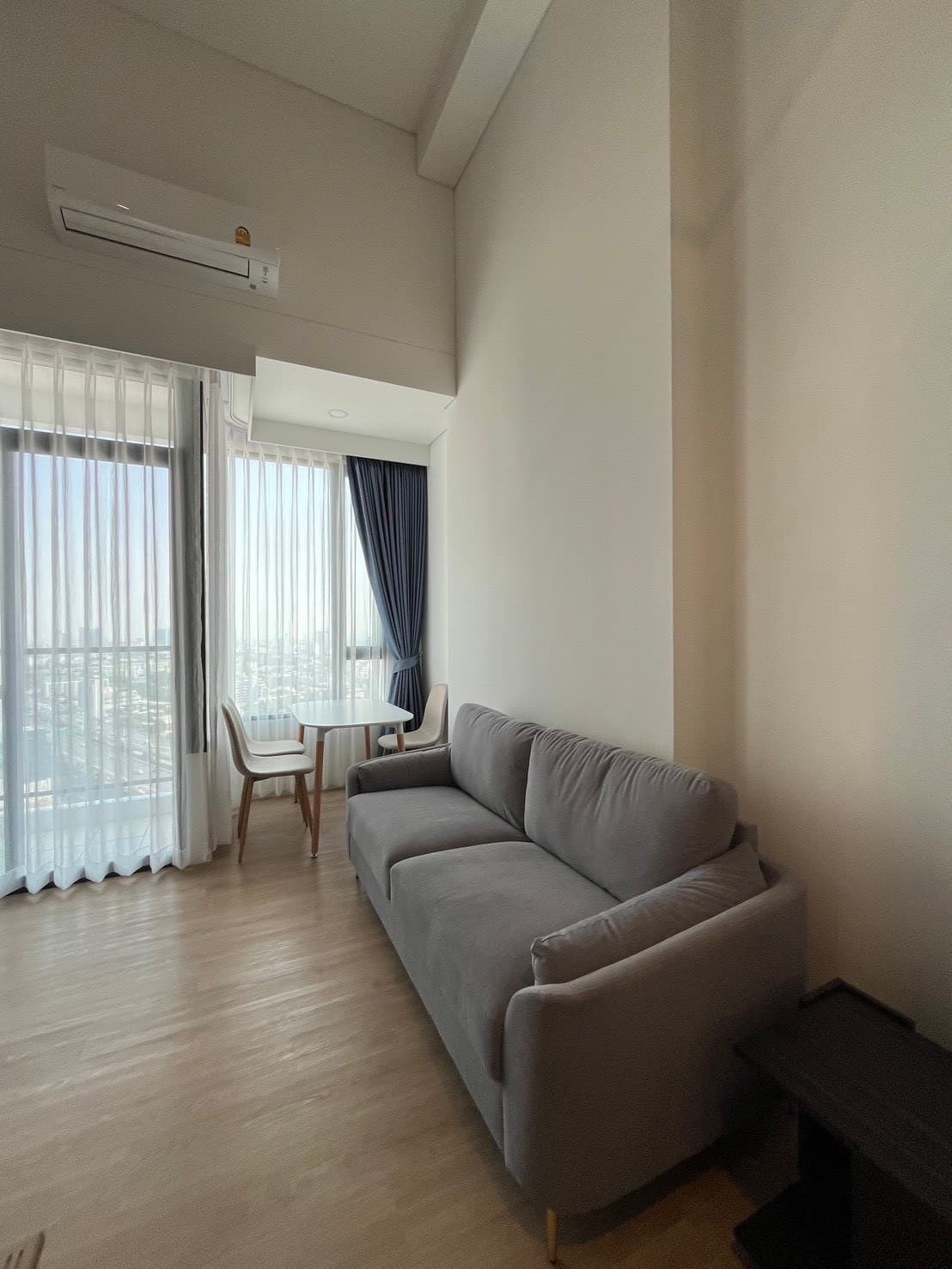 Siamese Rama 9 1BR — glass-partition bedroom, city outlook