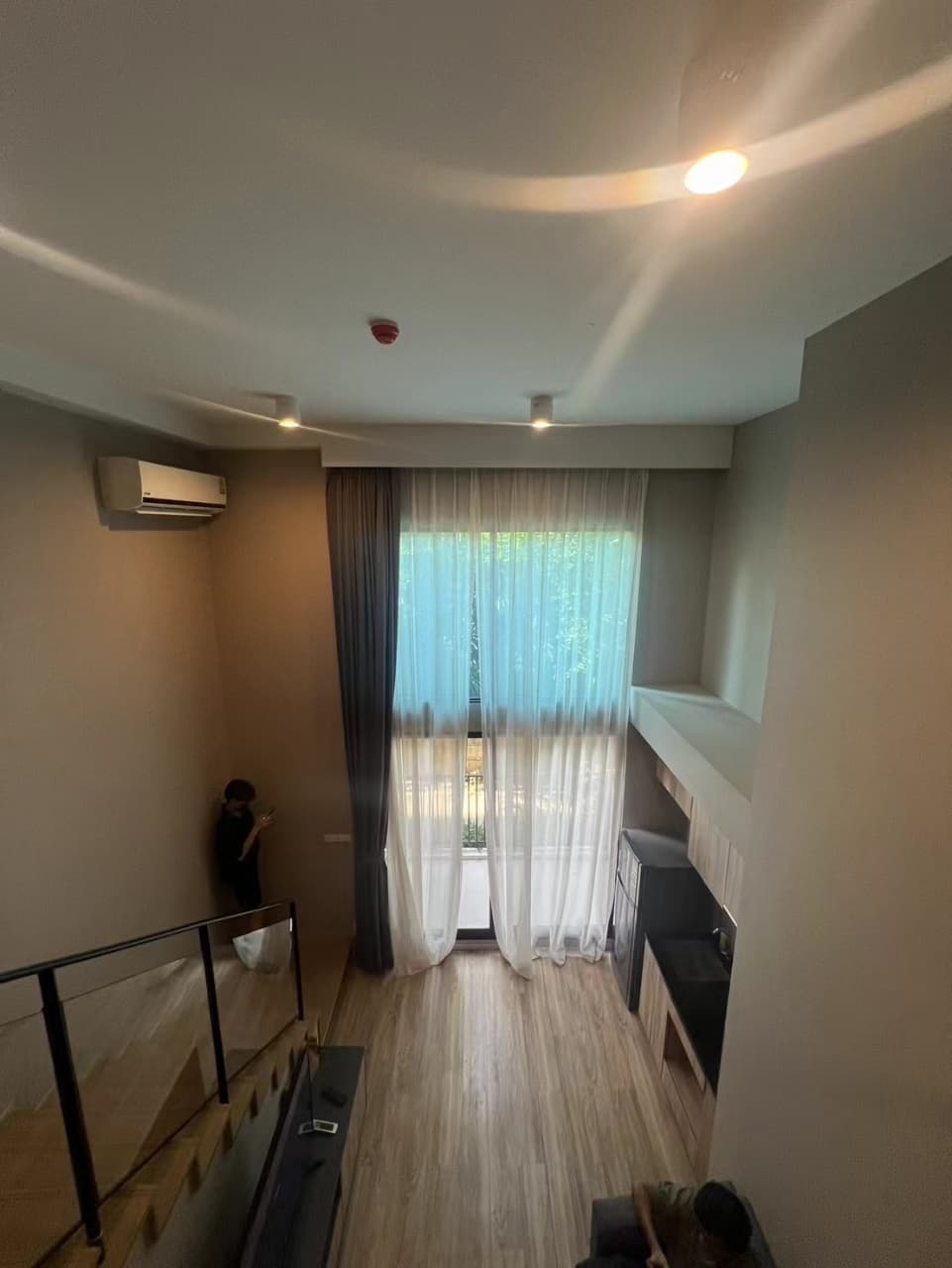 Two-storey 1BR with green-view window — Blossom Condo Sathon photo 1
