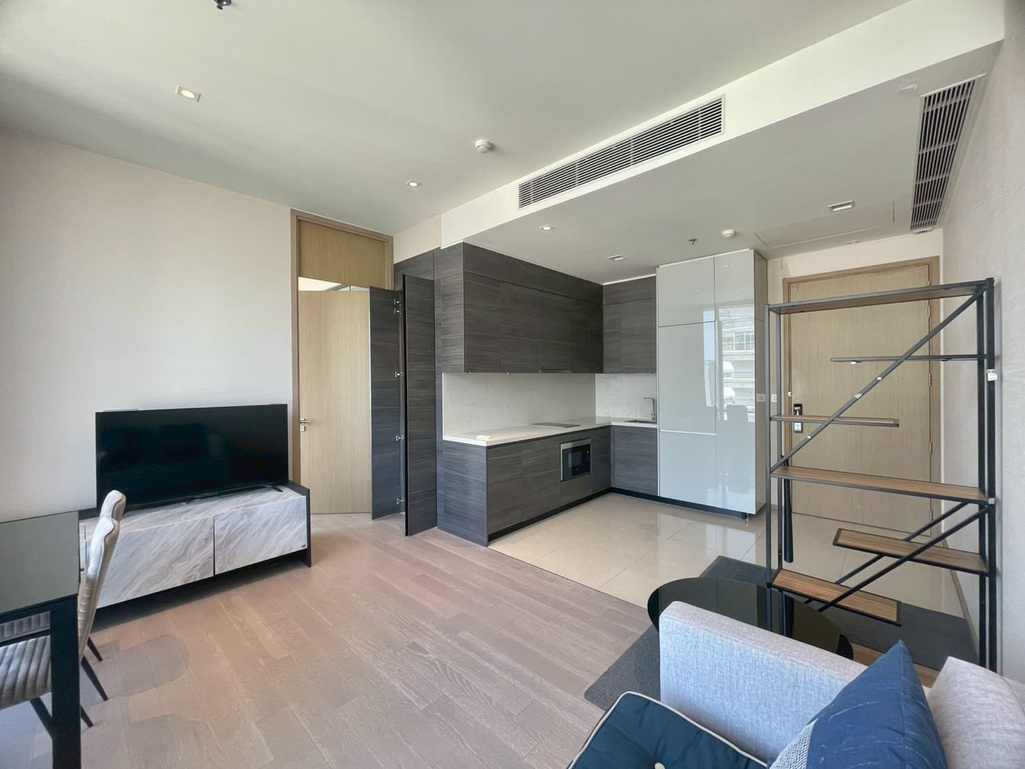 Marble-clad 1BR with high-floor city view — The Esse Asoke