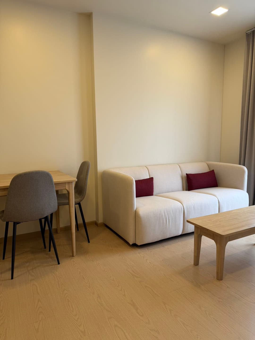 Warm minimal 1BR with dining nook — The Base Urban Rama9 photo 1